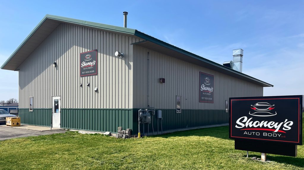 Shoney's Auto Body Shop location with sign